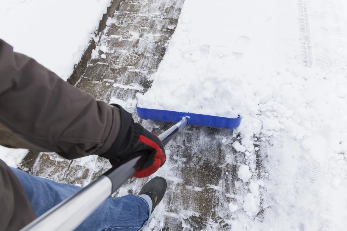 How to Protect Your Back While Shoveling Snow This Winter